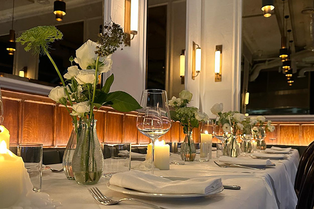 Flower adorned table at Dorian restaurant Notting Hill, recommended by Lords Hotel London